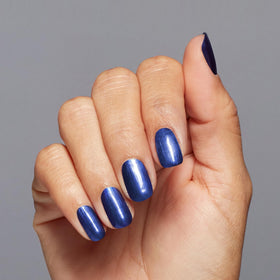 OPI Nail Lacquer Aquarius Renegade dark blue pearl polish bottle side view