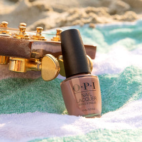 OPI Nail Lacquer Bonfire Serenade in a nail care setup