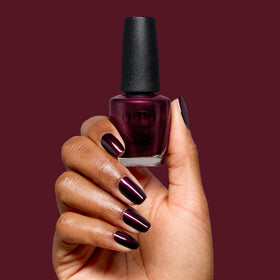 OPI Nail Lacquer Every Month is Oktoberfest dark purple shimmer with other nail care products