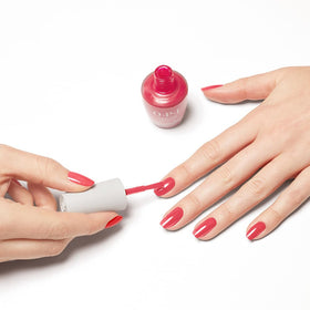 OPI Nature Strong Big Bloom Energy nail polish on a vanity table