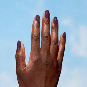 OPI Nature Strong Dark Purple Crème Nail Polish with natural background