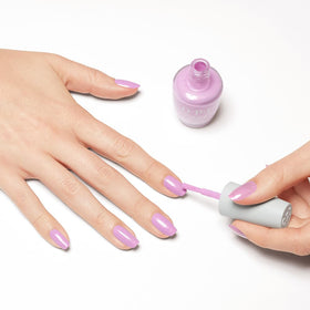 OPI Nature Strong Natural Mauvement nail polish in hand