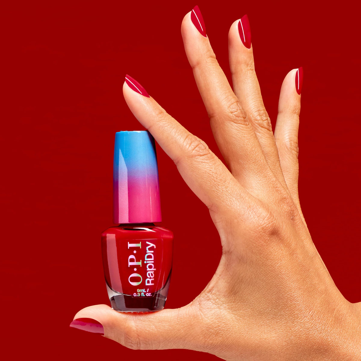 OPI RapiDry Quick Dry Nail Polish Opaque Bright Red application on nails