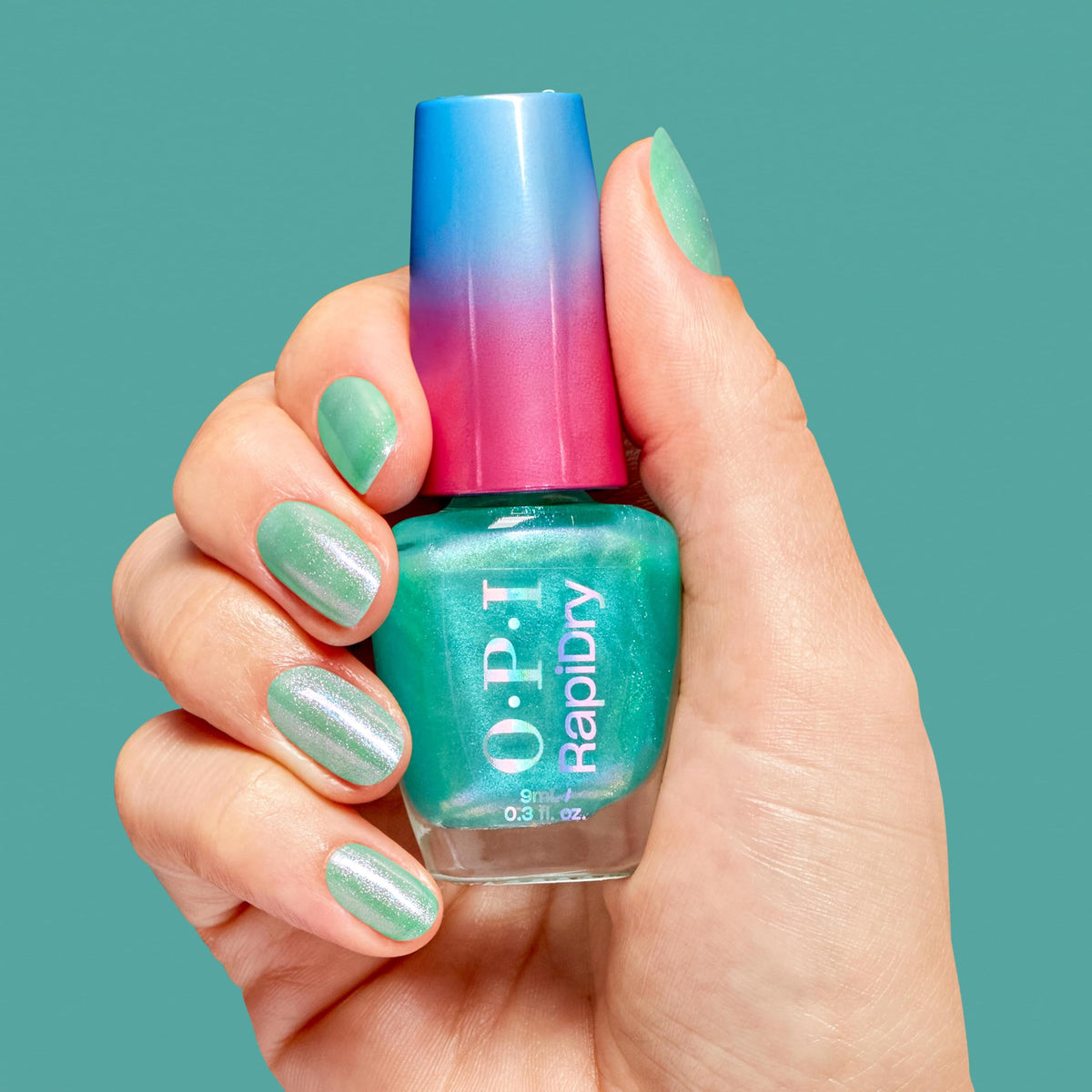 OPI RapiDry Quick Dry Nail Polish Soft Blue Shimmer application on nails