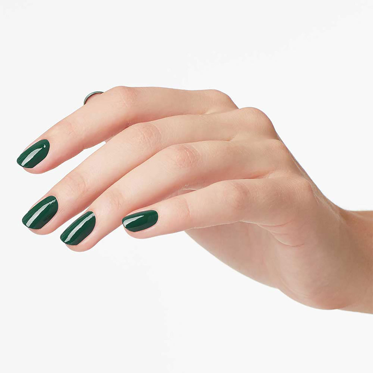 OPI Stay Off the Lawn!! nail polish with backdrop of nail art tools