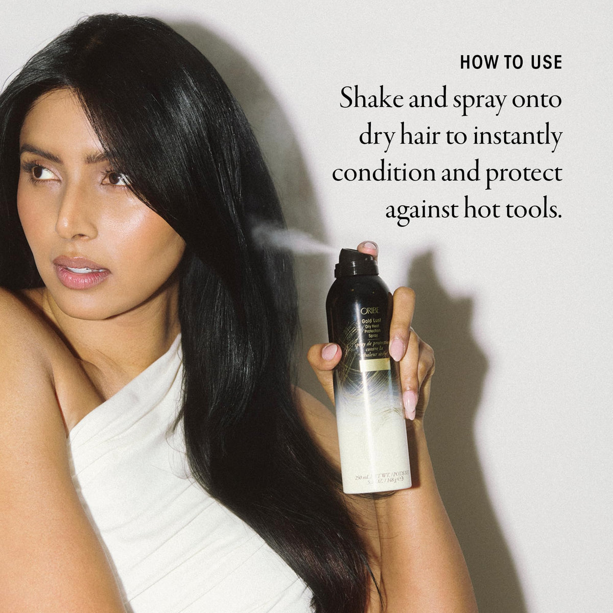 ORIBE Gold Lust Dry Heat Protection Spray with styling tools