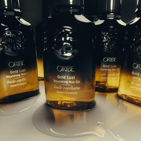 ORIBE Gold Lust Hair Oil with hair styling tools