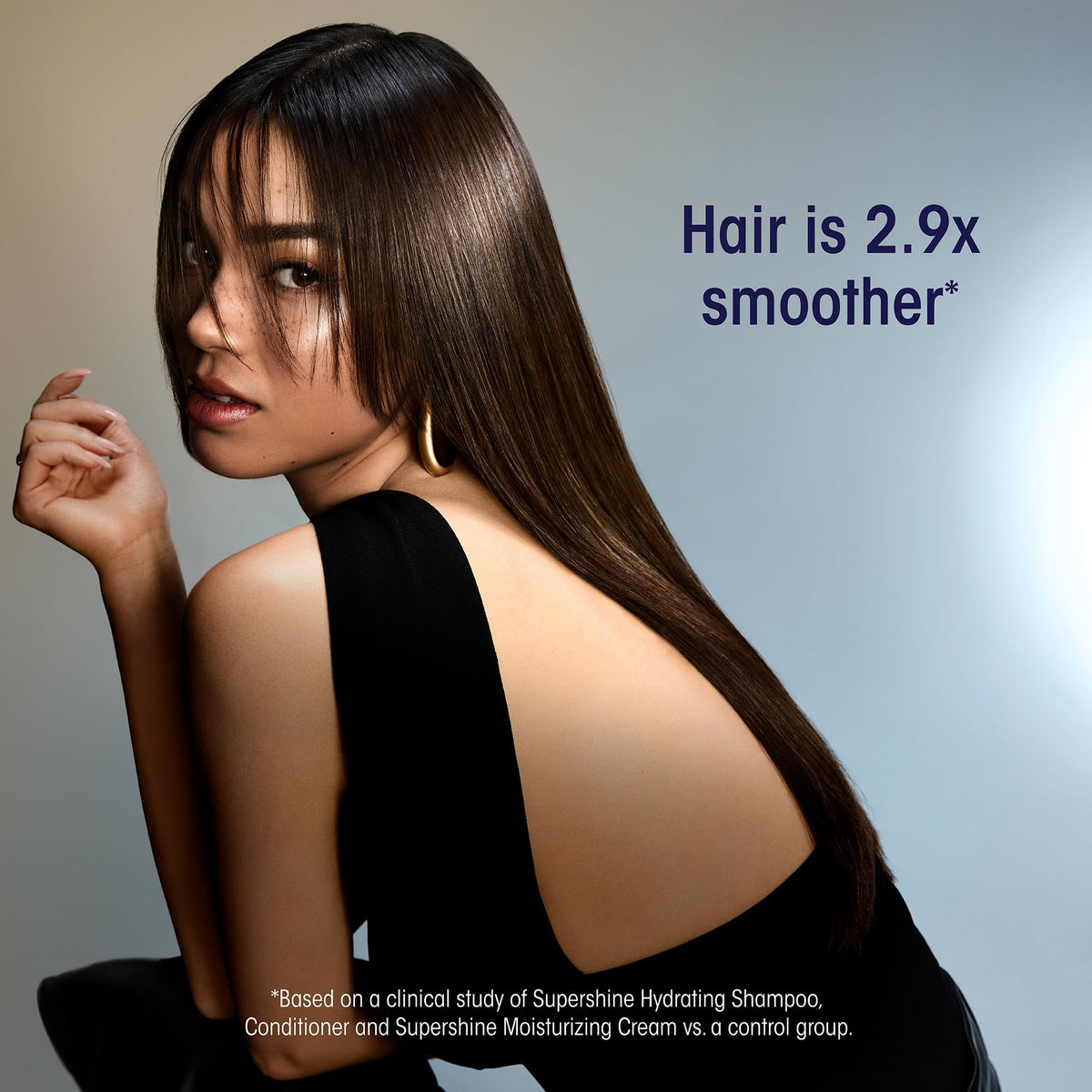 ORIBE Supershine cream applied to hair