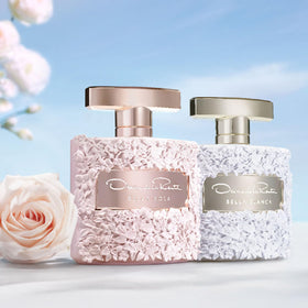 Oscar de la Renta Bella Rosa Eau de Parfum bottle on vanity