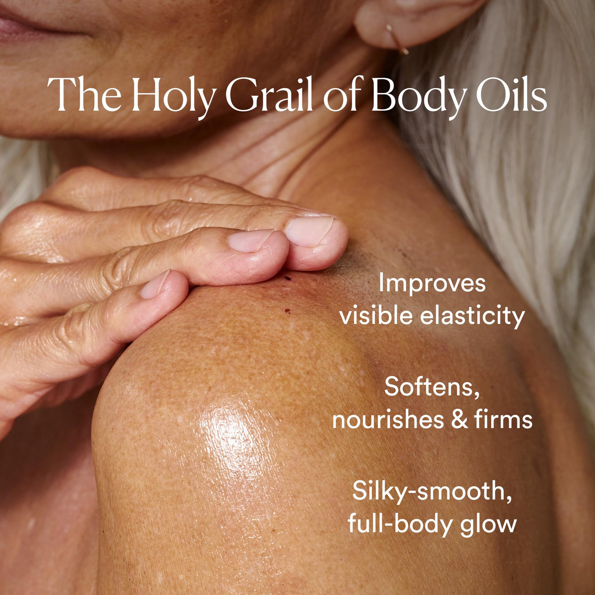OSEA Undaria Algae Body Oil with citrus fruits background
