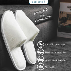 OSTADARRA spa slippers displayed on a bathroom floor