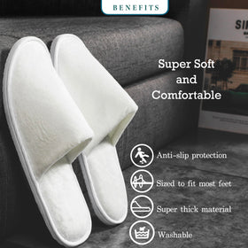 OSTADARRA spa slippers worn by a person