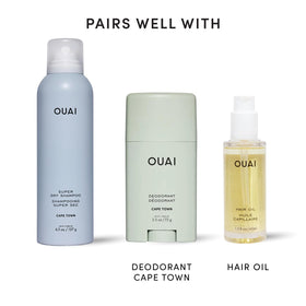 OUAI Super Dry Shampoo being applied to hair