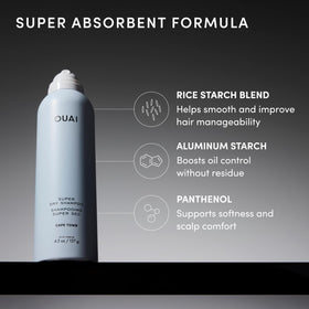 OUAI Super Dry Shampoo beside a fresh green fig and basil