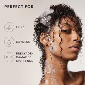 OUAI Thick Hair Shampoo Refill 32 Oz with flowers