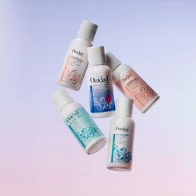 Ouidad Advanced Climate Control Curl Gel with styling tools