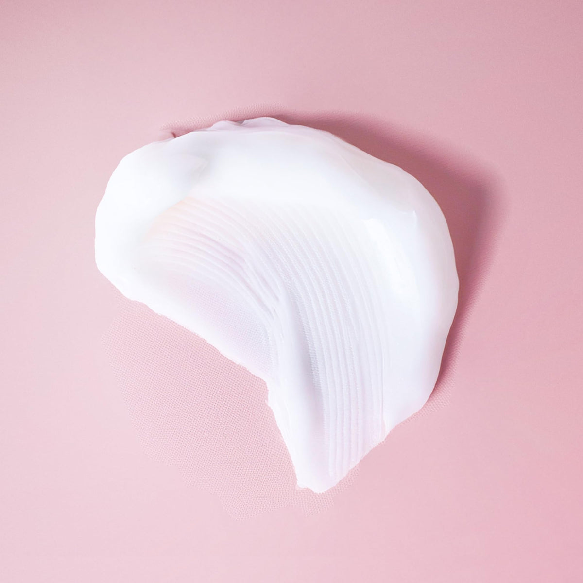 Ouidad styling cream with curl definition demonstration