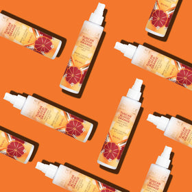 Pacifica Hair & Body Fragrance Mist Tuscan Blood Orange on a vanity