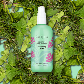 Pacifica Rosemary Mint Scalp Detox Shampoo with a minty garden backdrop