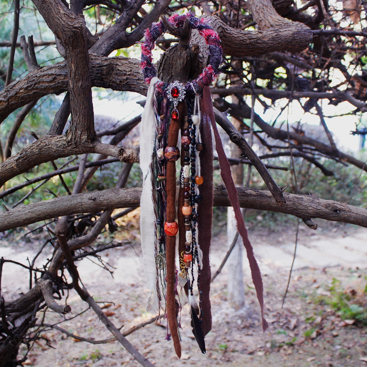 Packaging of the dreadlock hair tie showing its handmade quality