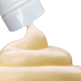 Palmer's Cocoa Butter Body Lotion in lifestyle setting on a bathroom counter