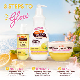 Palmer's Lemon Sorbet Brightening Whipped Body Cream with fresh lemons