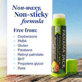 Panama Jack lip balm tropical flavor beside beach accessories