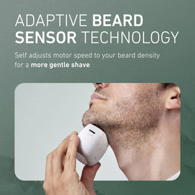 Panasonic ARC5 shaver with water running for easy cleaning
