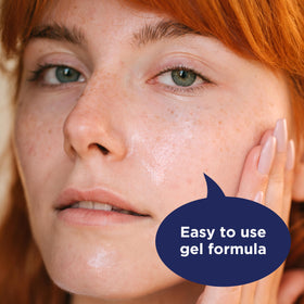 PanOxyl Adapalene 0.1% Leave-On Gel texture on fingertip