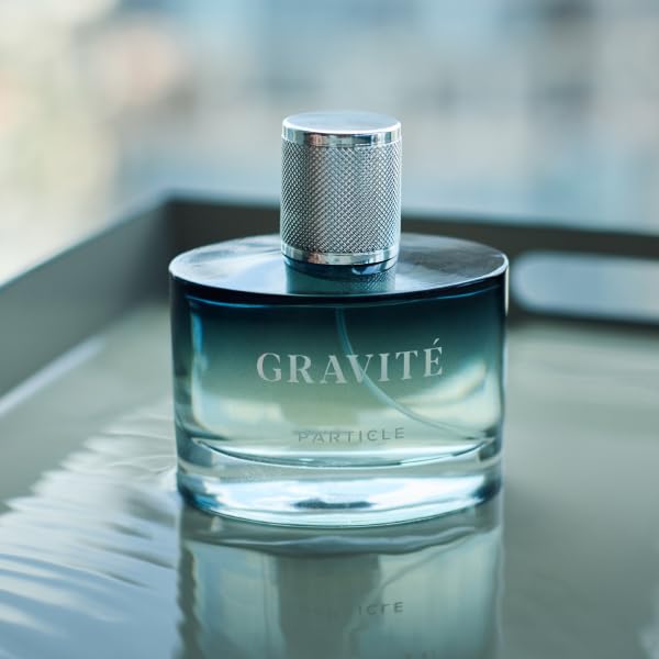 Particle Gravité Cologne Spray bottle on grooming table