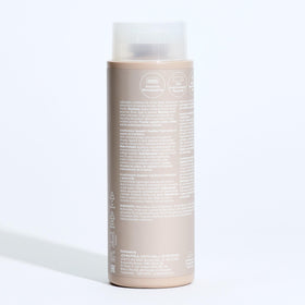 Paul Mitchell Awapuhi Conditioner with tropical plants