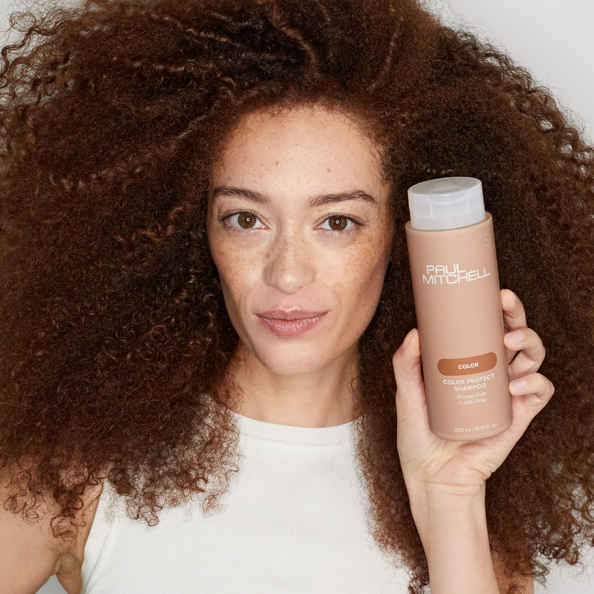 Paul Mitchell Color Protect Shampoo in a bathroom setting