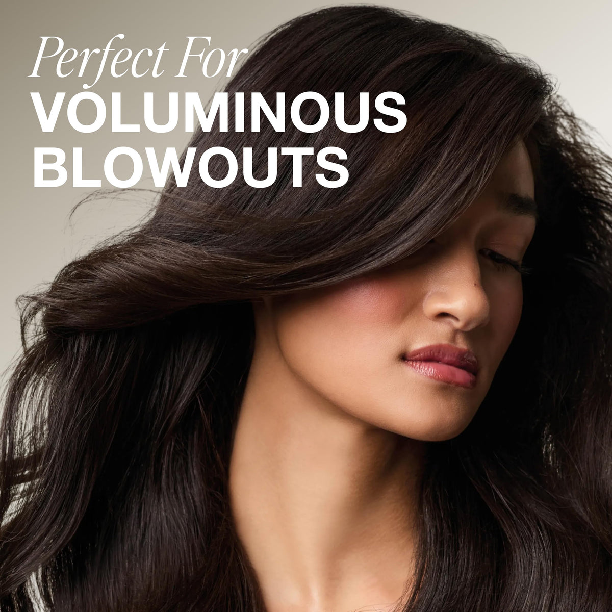 Paul Mitchell Extra-Body Sculpting Foam in use during blow-drying