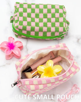 PAZIMIIK Checkered Makeup Bag in a travel bag for on-the-go use