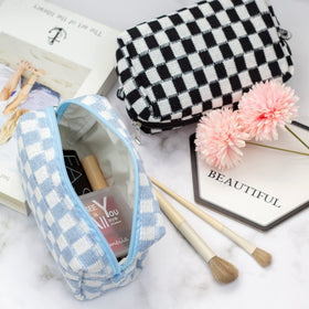 PAZIMIIK Checkered Makeup Bag open showing organized cosmetics