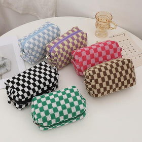 PAZIMIIK Checkered Makeup Bag with various cosmetics inside