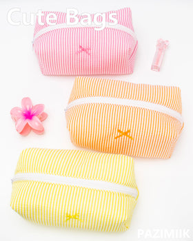 PAZIMIIK Cozy Makeup Bag on a table with beauty products