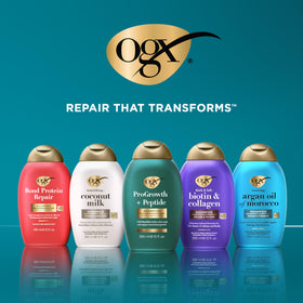 Person applying OGX Thick & Full Biotin & Collagen Shampoo