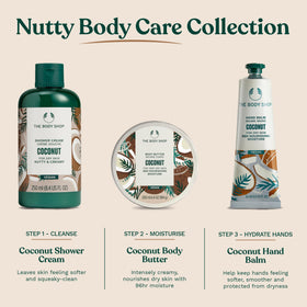 Person applying The Body Shop Coconut Body Butter on skin