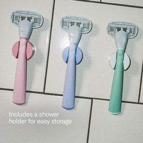 Person using Flamingo razor in shower