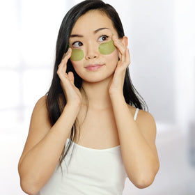 Peter Thomas Roth Cucumber De-Tox Eye Patches displayed with cucumber slices