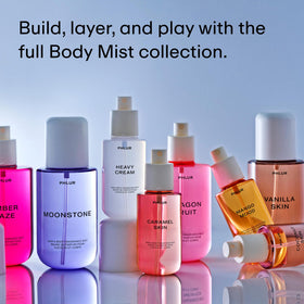 PHLUR Caramel Skin Body Mist packaging on a table