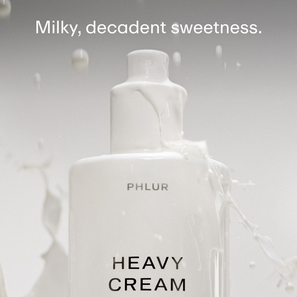 PHLUR Heavy Cream Body Mist bottle with cap