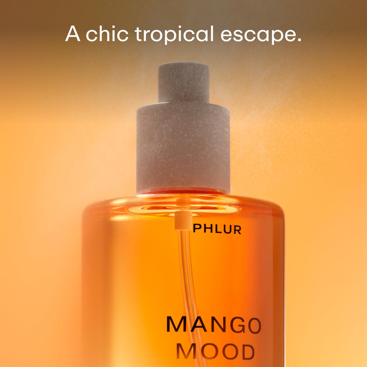 PHLUR Mango Mood Body Mist bottle with tropical background