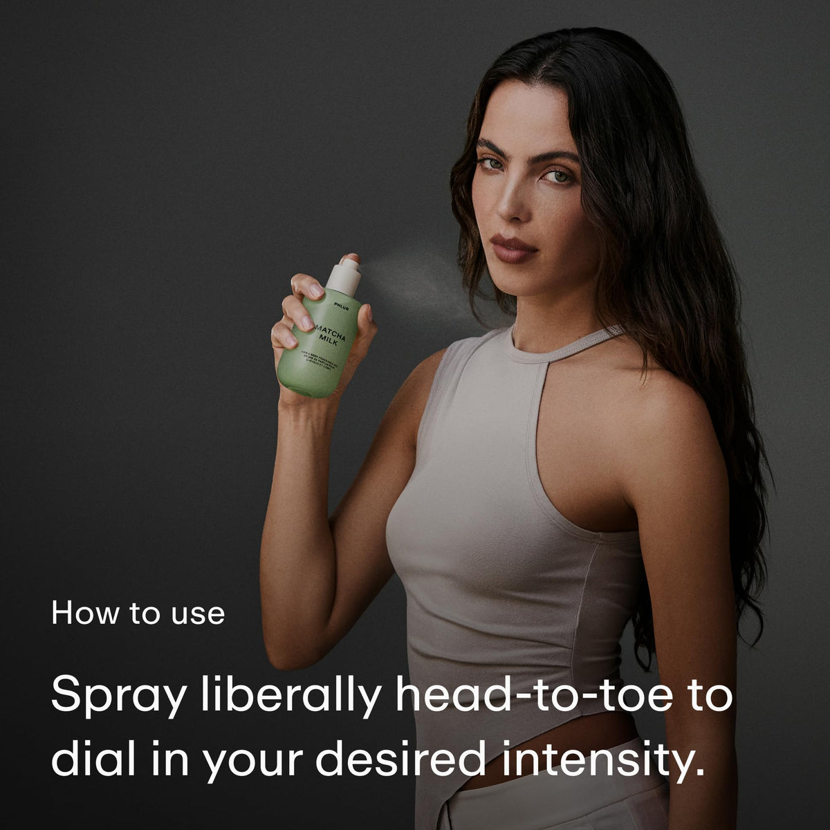 PHLUR Matcha Milk Body Mist on a vanity with greenery