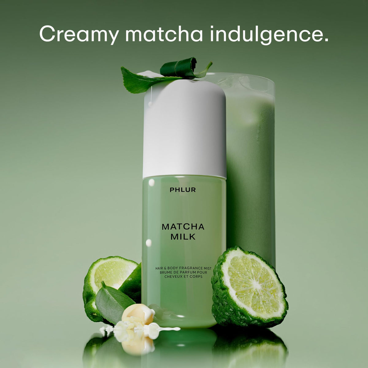 PHLUR Matcha Milk Body Mist packaging with floral background