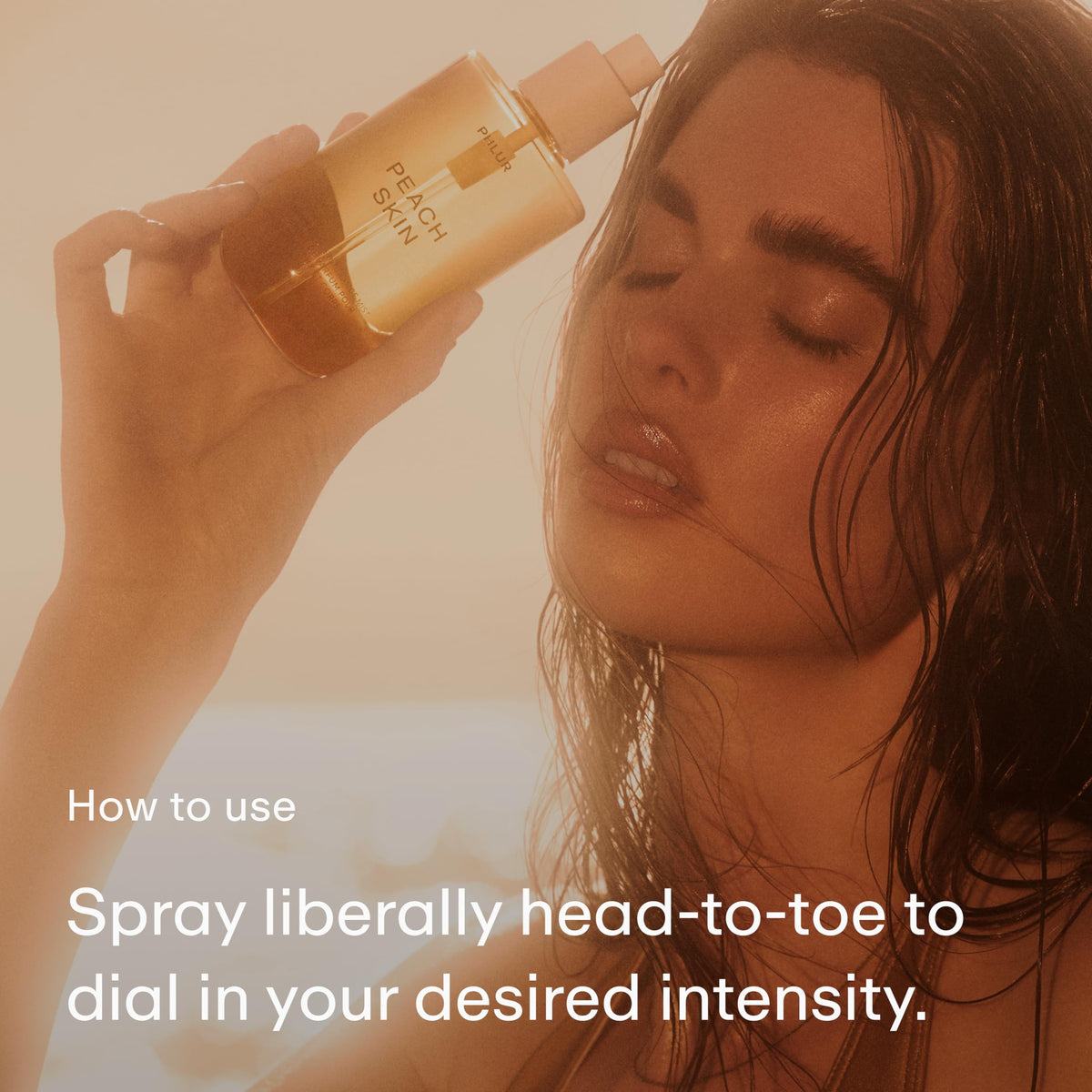 PHLUR Peach Skin Body Mist misting on skin