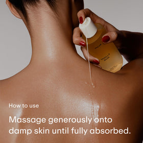 PHLUR Vanilla Skin Body Oil on a bathroom counter