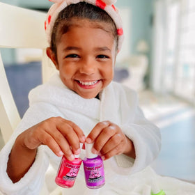 Piggy Paint nail polish application on a child's nails