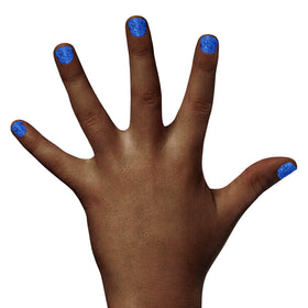 Piggy Paint nail polish application process with a brush